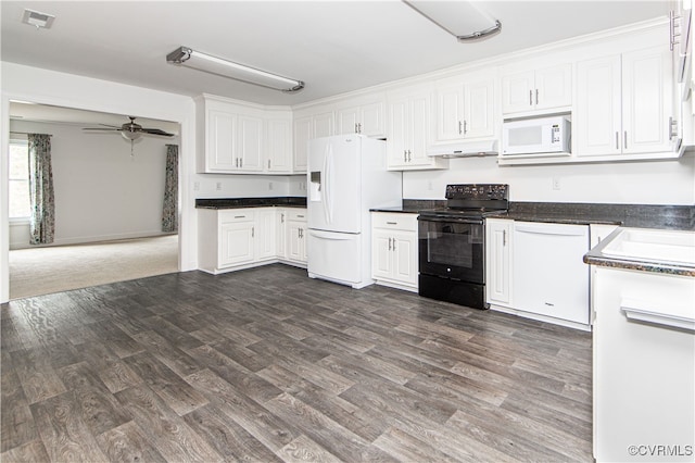 kitchen featuring under cabinet range hood, white appliances, white cabinetry, a ceiling fan, and dark countertops