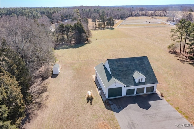 birds eye view of property featuring a rural view