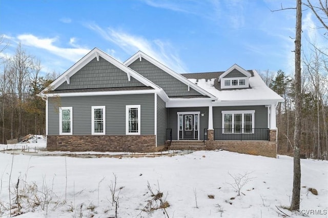 craftsman-style home featuring covered porch