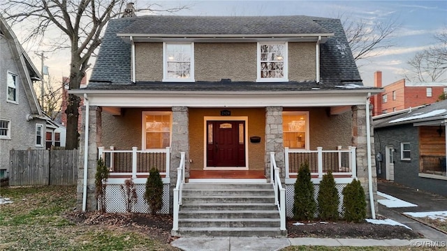 view of front of home featuring covered porch