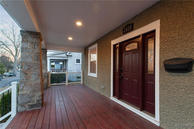 wooden deck featuring a porch