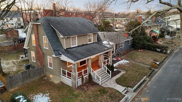 view of front of home featuring cooling unit