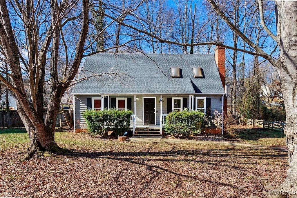 view of new england style home