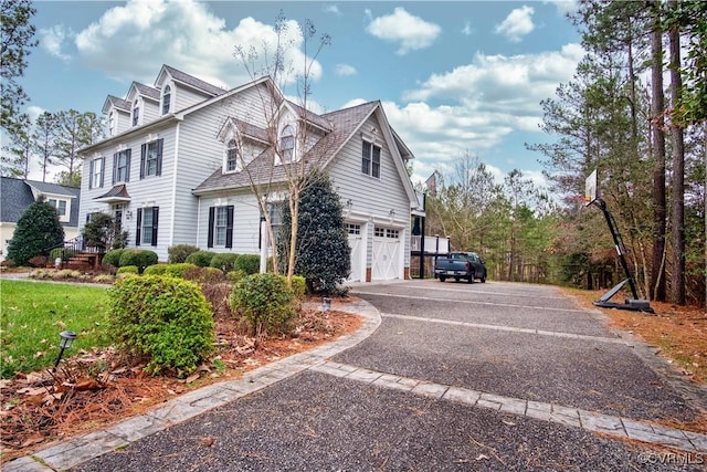 view of property exterior with a garage