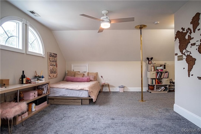 carpeted bedroom featuring ceiling fan and vaulted ceiling