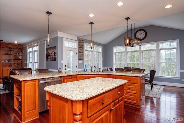 kitchen featuring dishwasher, a center island, decorative light fixtures, french doors, and lofted ceiling