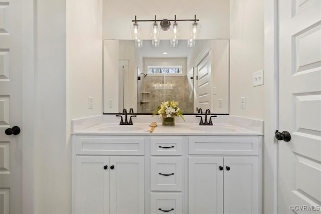 bathroom with vanity and walk in shower