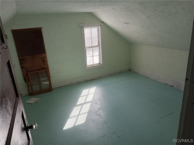 bonus room with lofted ceiling