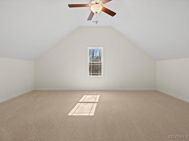 bonus room with carpet, ceiling fan, lofted ceiling, and baseboards