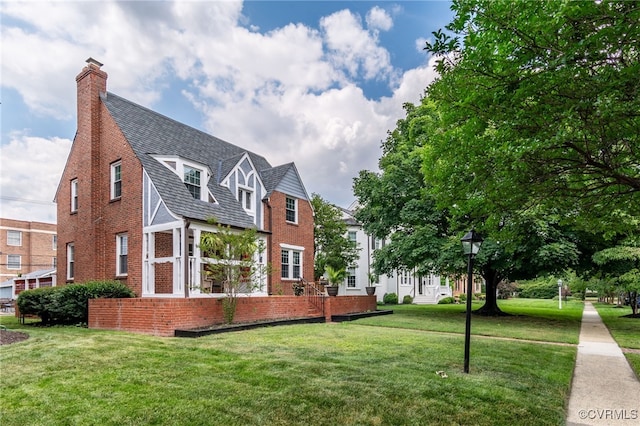 exterior space featuring a lawn