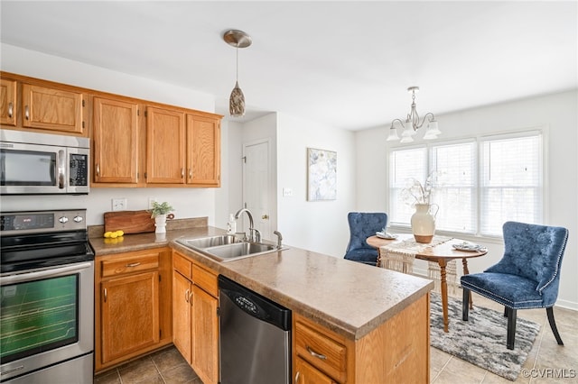 kitchen with pendant lighting, stainless steel appliances, light tile patterned floors, an inviting chandelier, and sink