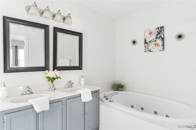 bathroom featuring vanity and a bathing tub