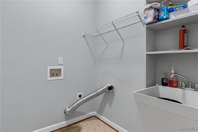 laundry room featuring sink, hookup for a washing machine, and hookup for an electric dryer