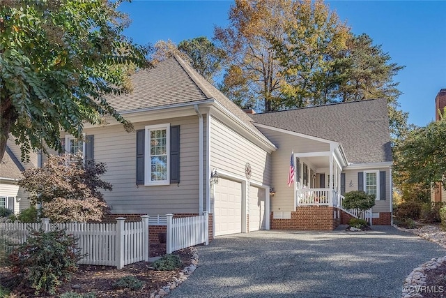 view of side of property with a garage