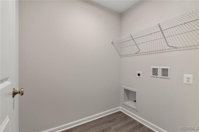 laundry area with hookup for an electric dryer, washer hookup, and dark wood-type flooring