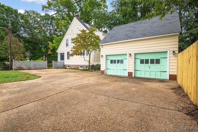 garage featuring fence