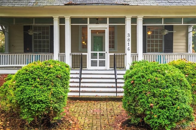 doorway to property featuring covered porch