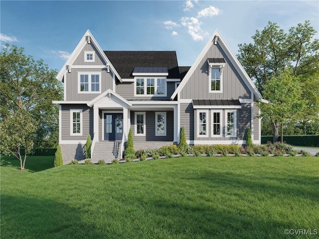 view of front of home featuring a front lawn, a standing seam roof, board and batten siding, a shingled roof, and metal roof