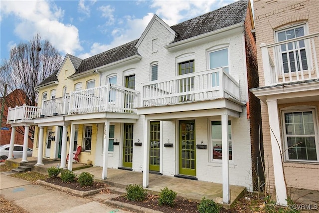 view of property featuring a balcony