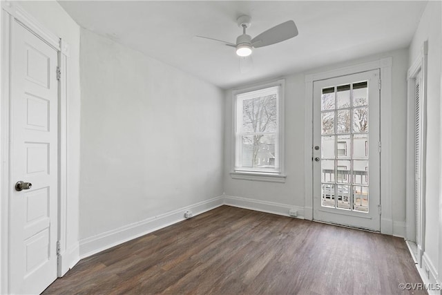 interior space featuring dark hardwood / wood-style floors and ceiling fan