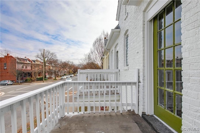 balcony featuring a porch