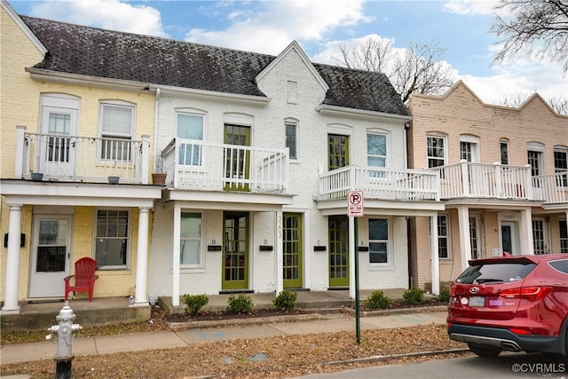 view of property featuring a balcony