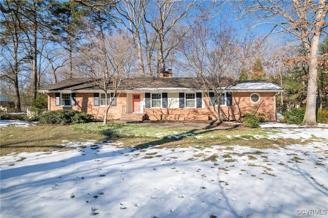 ranch-style house featuring a lawn