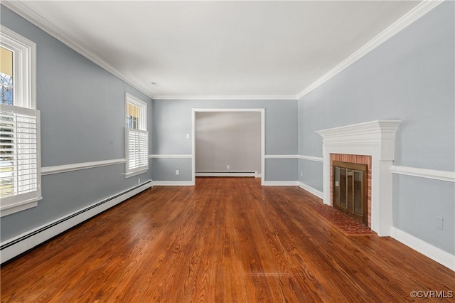 unfurnished living room featuring a baseboard radiator, wood-type flooring, ornamental molding, and a fireplace