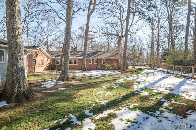 view of yard covered in snow