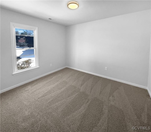 view of carpeted spare room