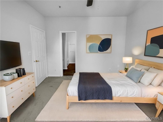 carpeted bedroom featuring ceiling fan