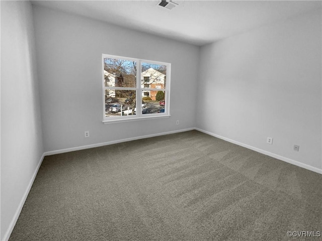 spare room with carpet