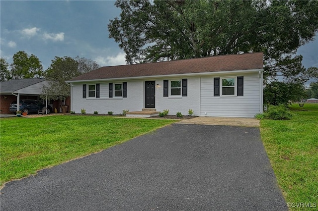 ranch-style house with a front yard