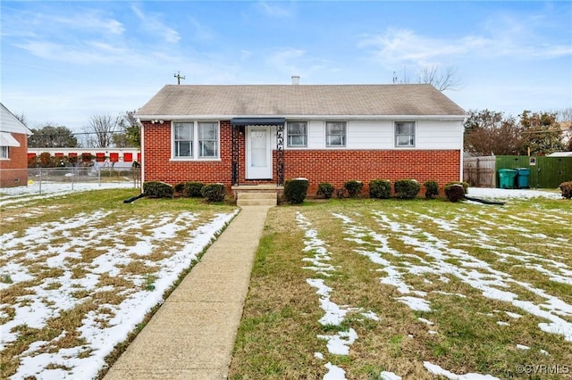 bungalow featuring a yard