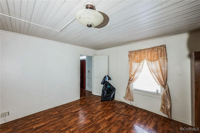 unfurnished room featuring dark hardwood / wood-style floors