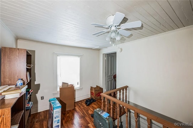 office with ceiling fan, dark hardwood / wood-style flooring, and ornamental molding