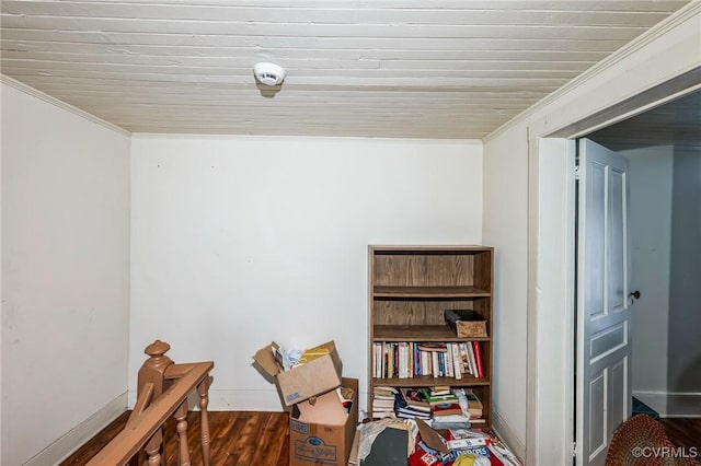 interior space featuring crown molding and hardwood / wood-style flooring