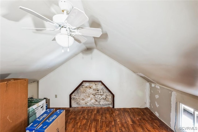 bonus room featuring ceiling fan, dark hardwood / wood-style flooring, and lofted ceiling