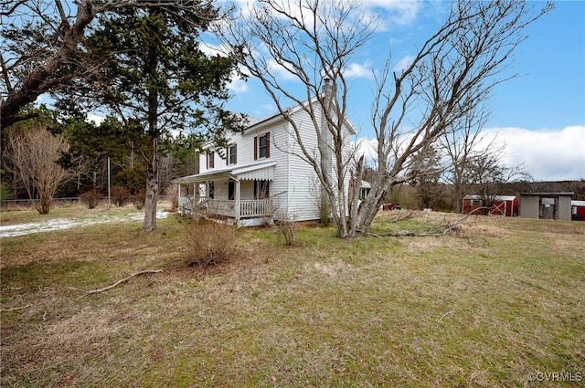 view of yard with a porch