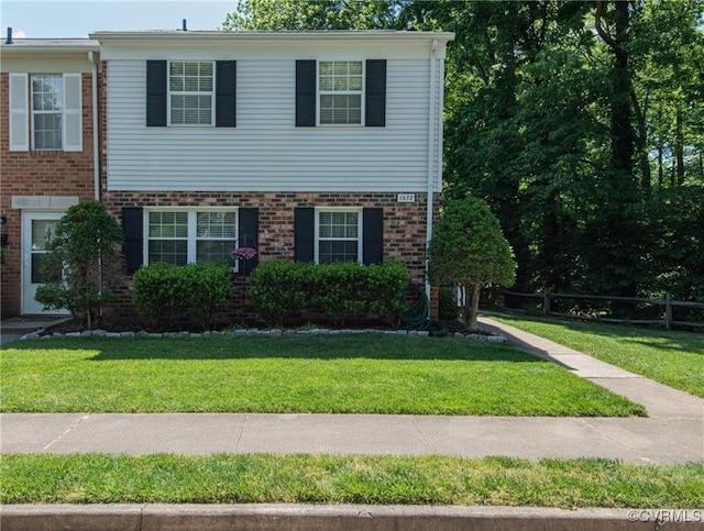 view of front of home featuring a front lawn