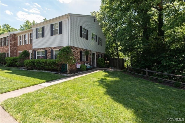 view of home's exterior with a yard