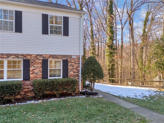 view of home's exterior featuring a lawn