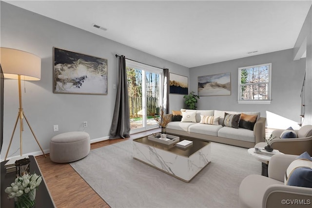 living room with hardwood / wood-style flooring