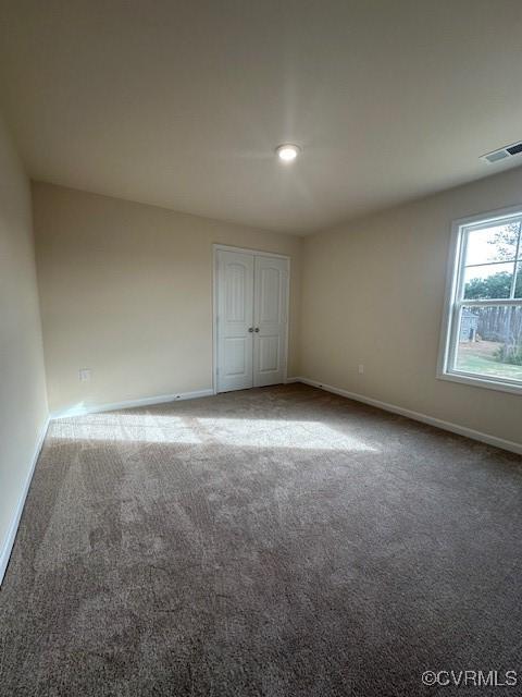 view of carpeted empty room