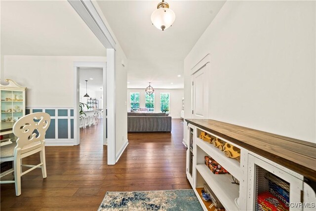 hallway featuring dark wood-type flooring