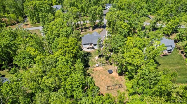 birds eye view of property with a rural view