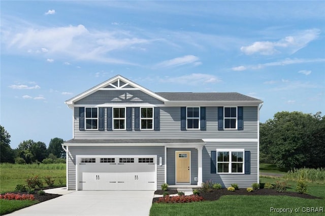 view of front facade with a front lawn and a garage