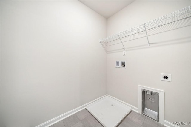 laundry area featuring hookup for an electric dryer and hookup for a washing machine