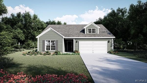 view of front of property with a front yard and a garage