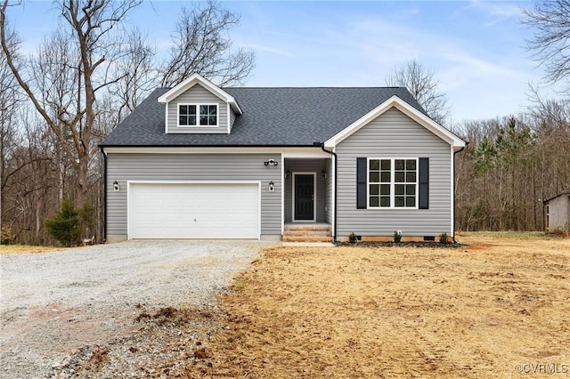 view of front facade with a garage, gravel driveway, and roof with shingles